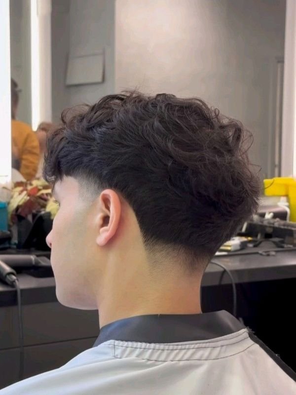 Low Taper Fade Layered Fringe