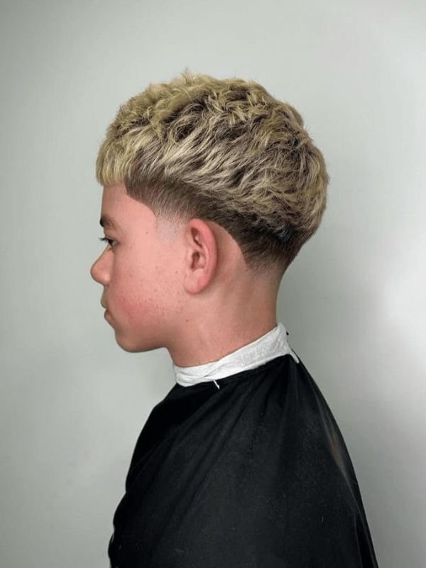 Low taper fade fluffy hair blonde