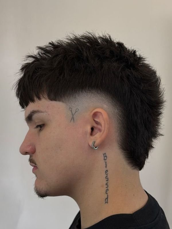 Mid Taper Fade with Textured Fringe Mullet