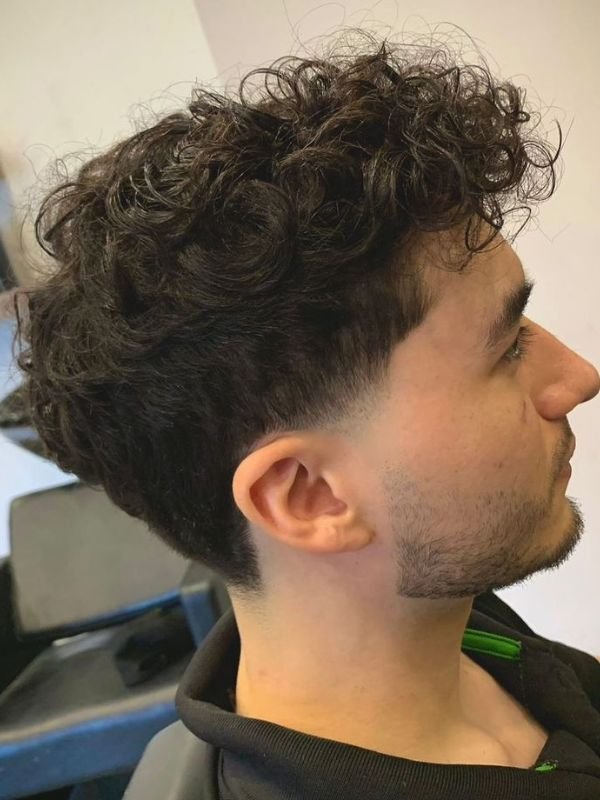 Low Taper Fade Quiff for Curly Hair