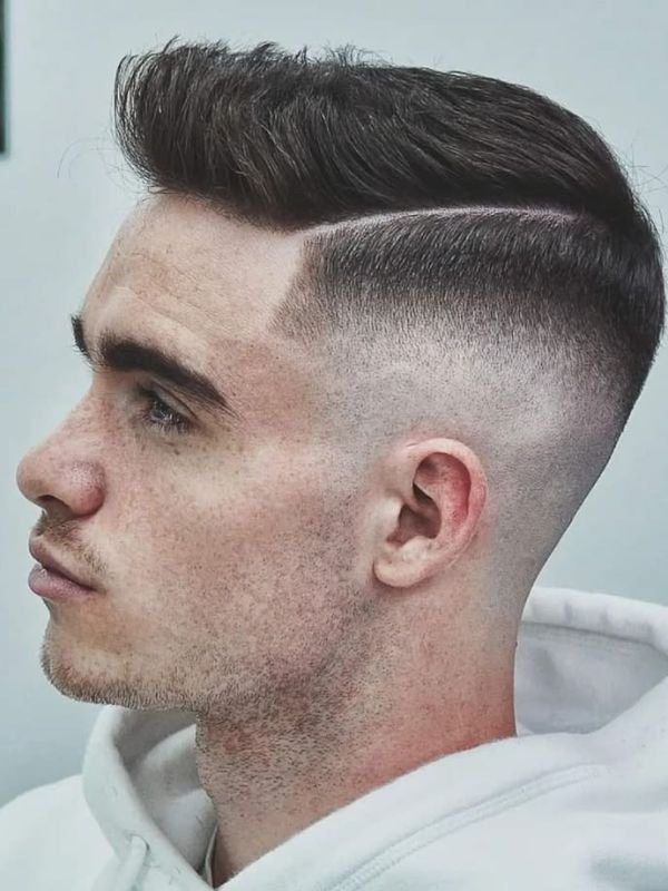Low Taper Fade Quiff with Hard Part